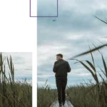 Man in black clothing walking on a wooden pier