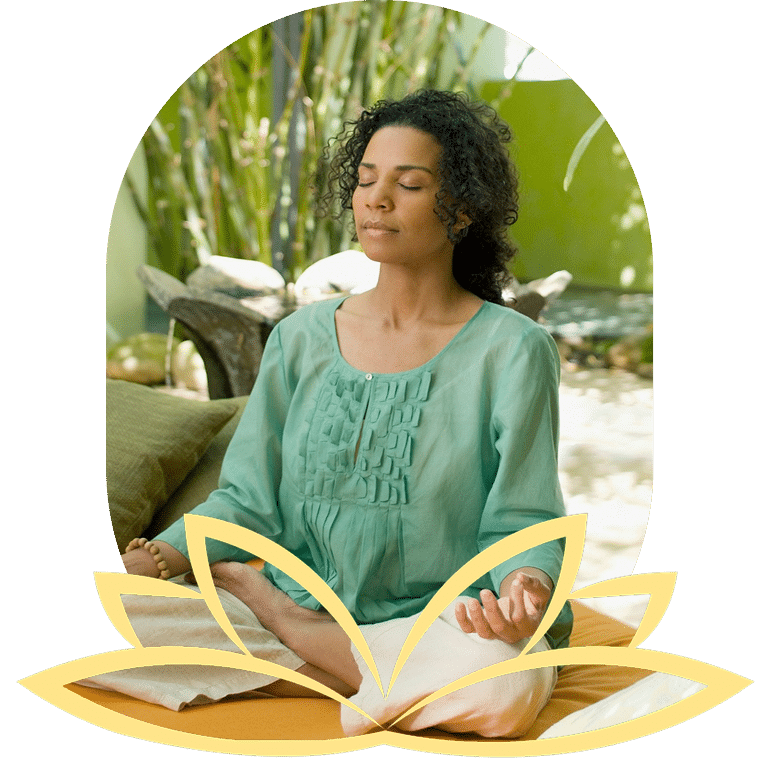 Woman in white shirt doing tree pose with misty mountains.